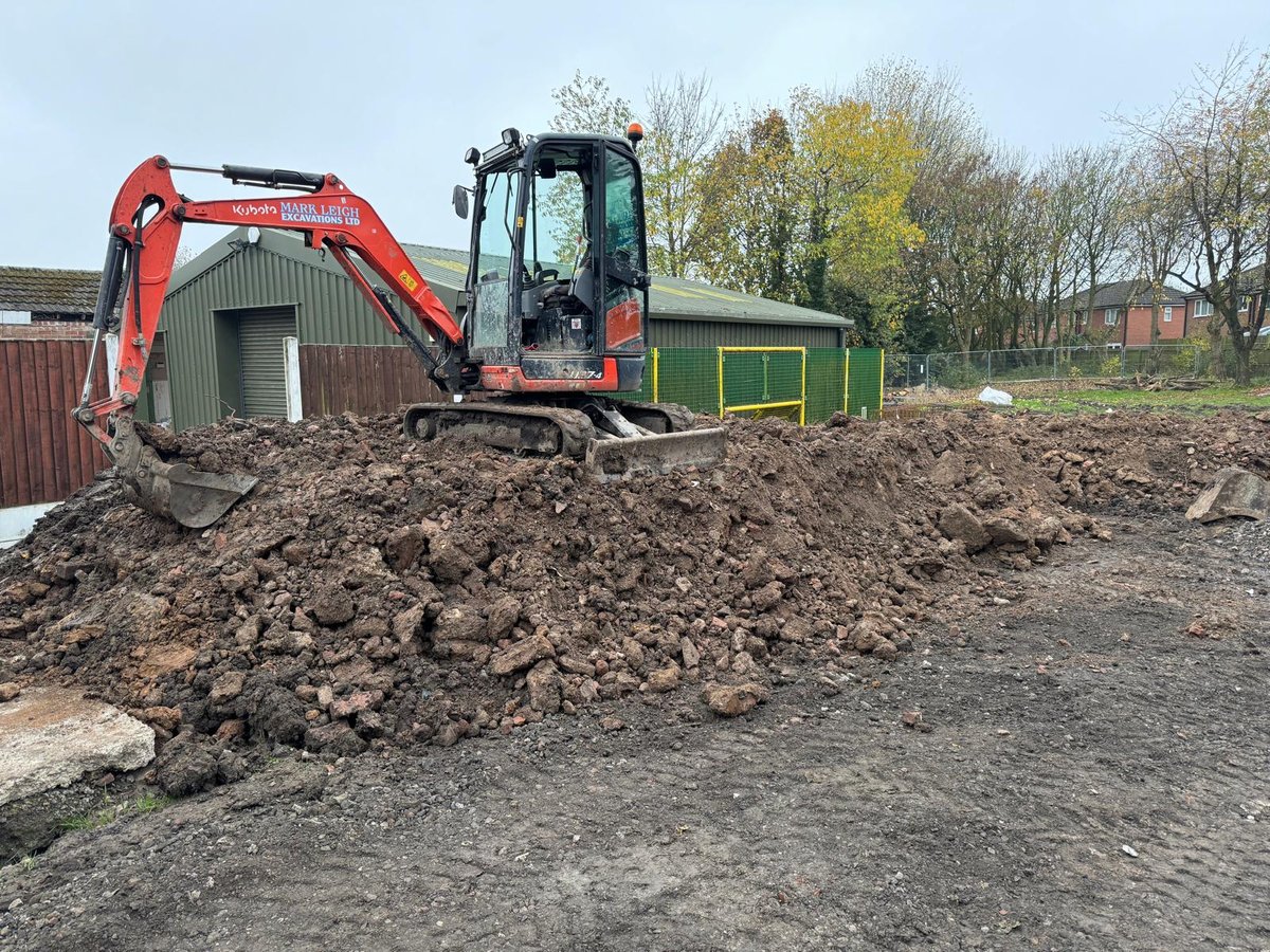 Professional excavation services Manchester - digger excavating foundation